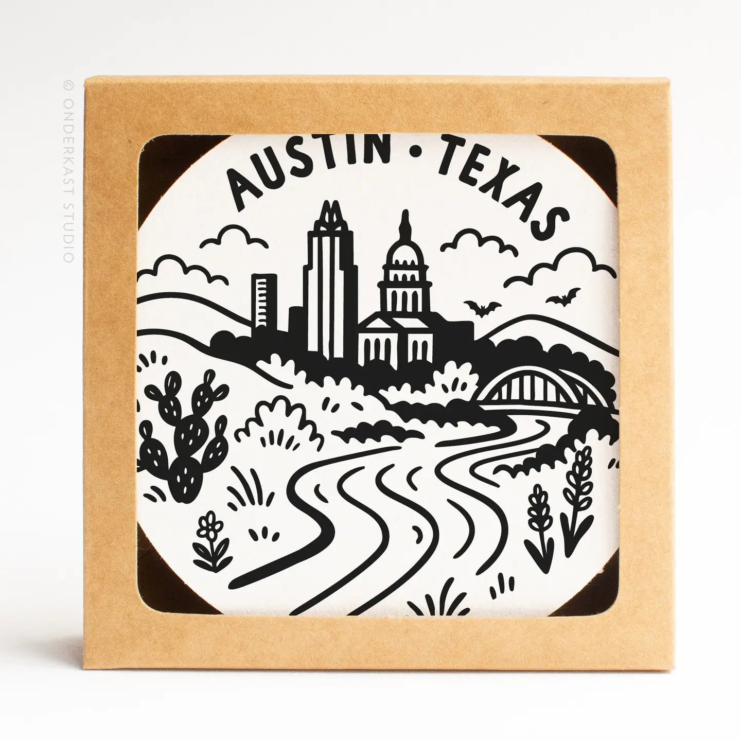 Austin Texas skyline letterpress coaster set displayed as a refined Texas home décor gift from The Texas Gift Company storefront