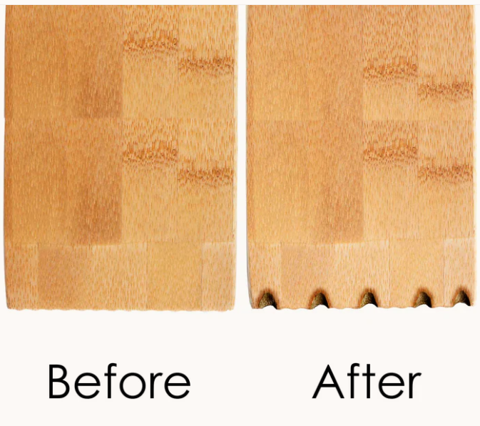 Wooden BBQ scraper being used on a grill grate as a practical Texas grilling gift from The Texas Gift Company storefront