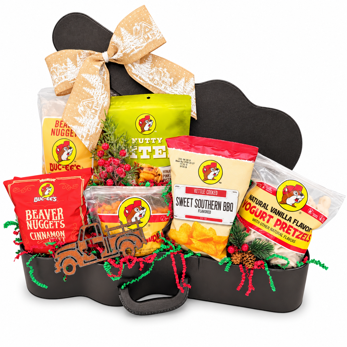 Buc-ee’s Christmas Road Trip curated guitar case gift with six snacks, a Texas truck magnet and holiday ribbon on a white background.