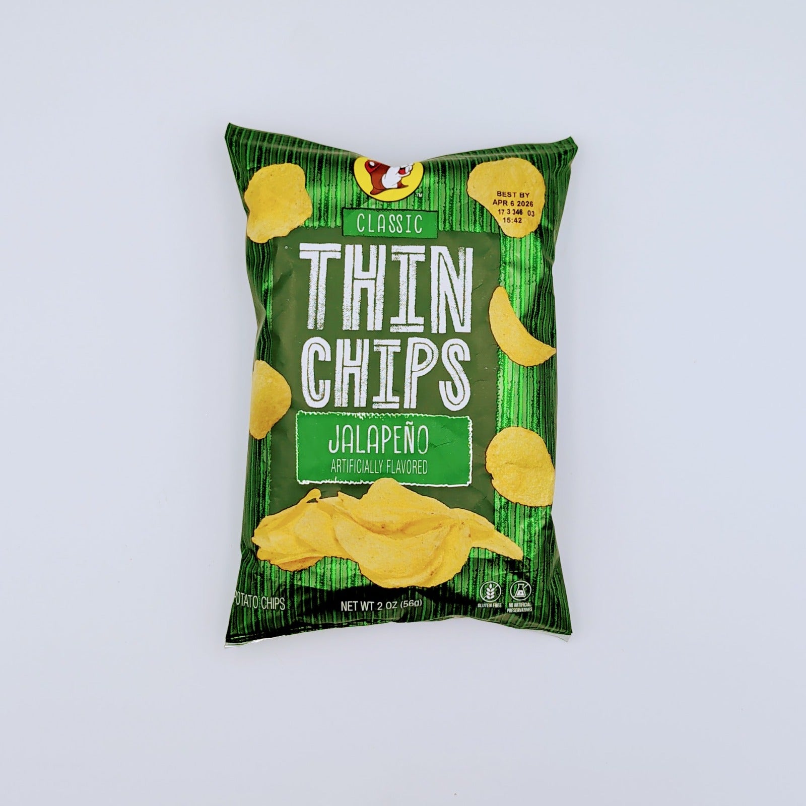 Buc-ee’s jalapeño thin chips shown in a snack bowl as part of a Texas snack gift assortment from The Texas Gift Company storefront