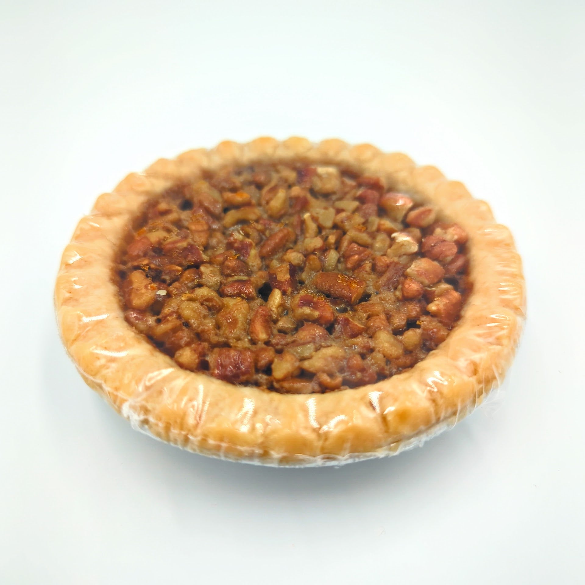 Chocolate bourbon pecan mini pie displayed as a gourmet Texas dessert gift from The Texas Gift Company storefront