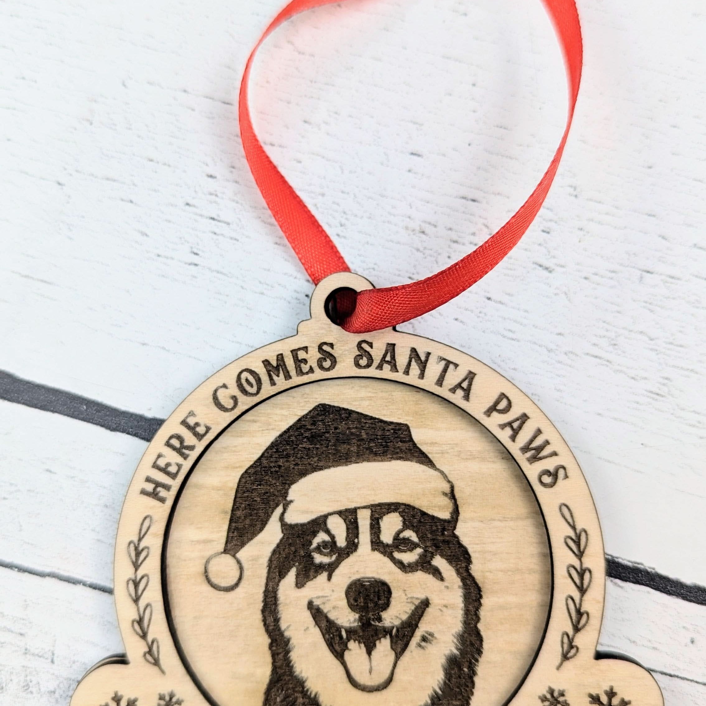 Custom dog breed Christmas ornament personalized with a pet’s name displayed as a heartfelt Texas keepsake from The Texas Gift Company storefront