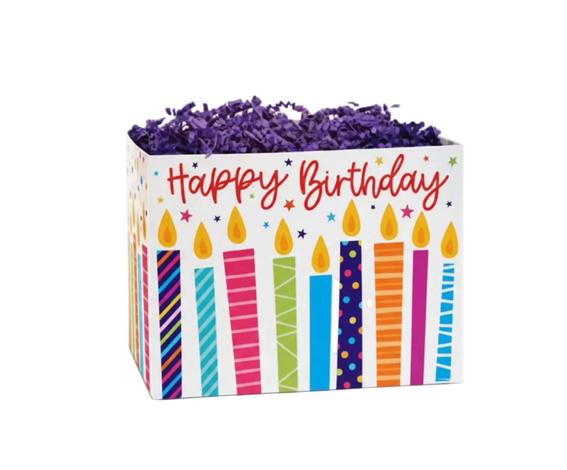 Happy birthday themed gift box with colorful candle design and purple shredded paper filler