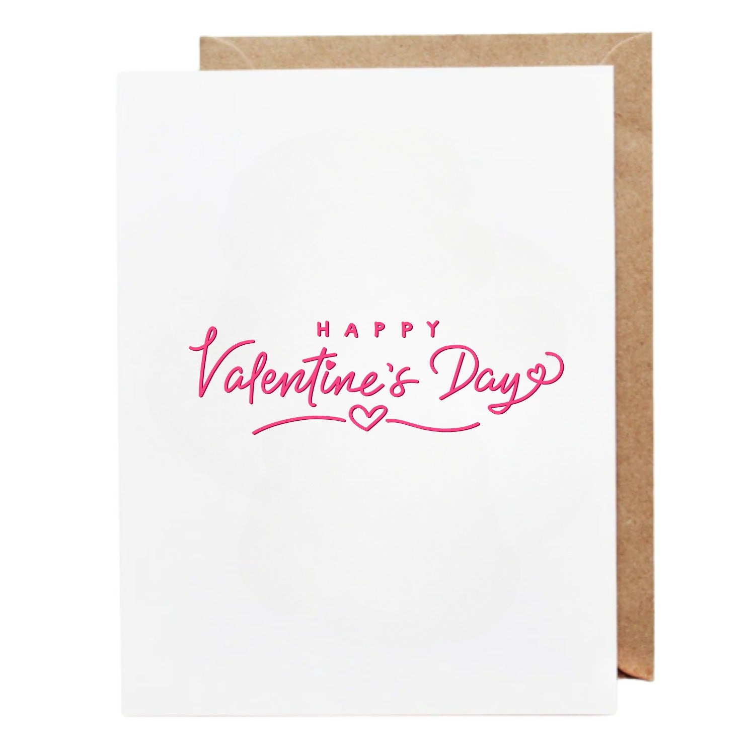 White Valentine’s Day greeting card with pink handwritten-style text reading “Happy Valentine’s Day,” featuring a small heart and curved underline beneath the text, shown with a brown envelope behind it
