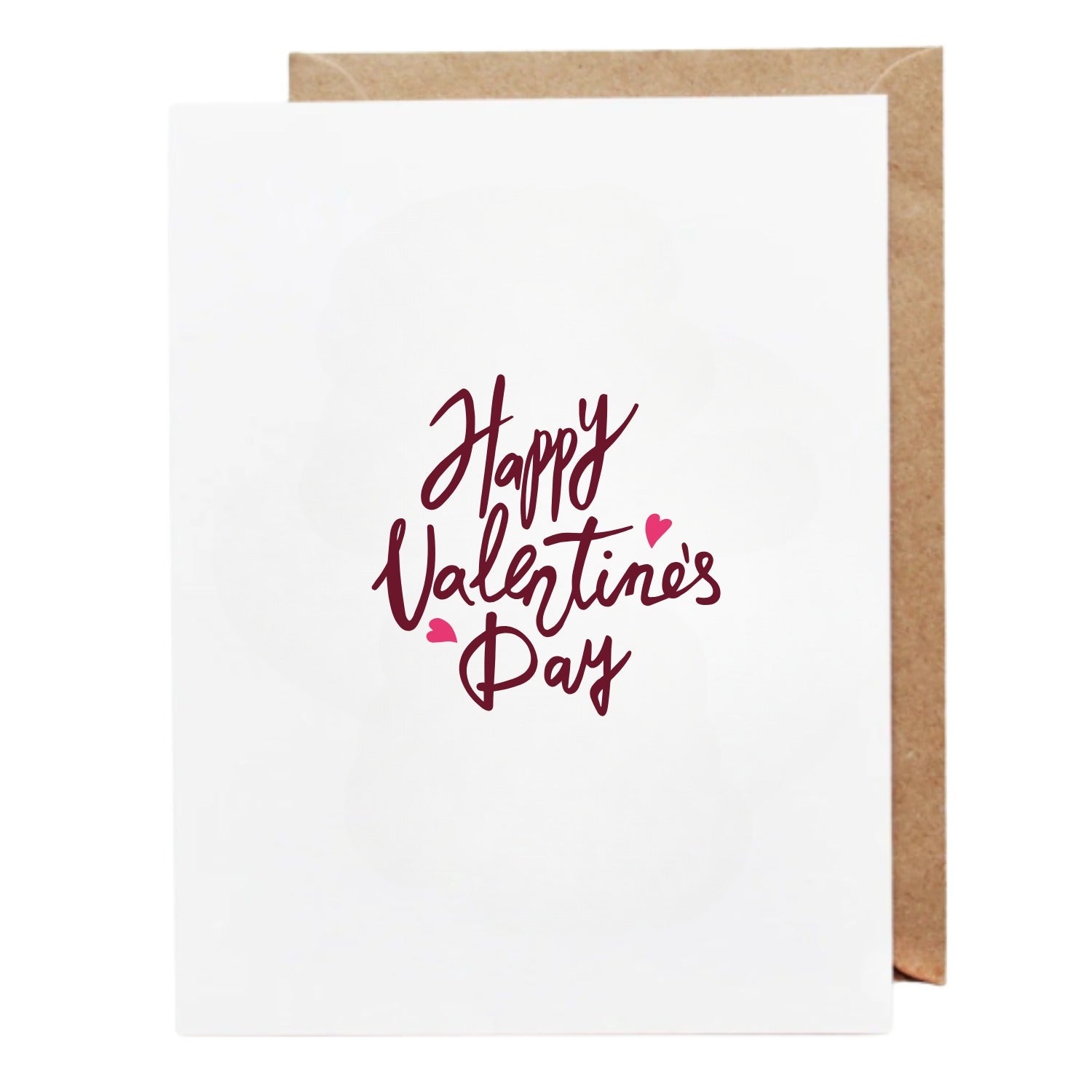 White Valentine’s Day greeting card with handwritten-style burgundy text reading “Happy Valentine’s Day,” accented with small pink heart icons, shown with a brown envelope behind it