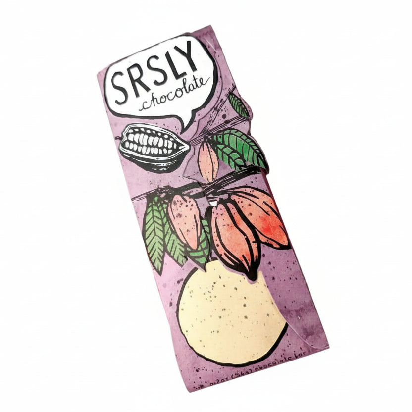 Illustrated “Srsly Chocolate” artisan chocolate bar wrapper with cacao pod artwork and pastel purple background, featured in a Texas craft chocolate and sweets gift collection.