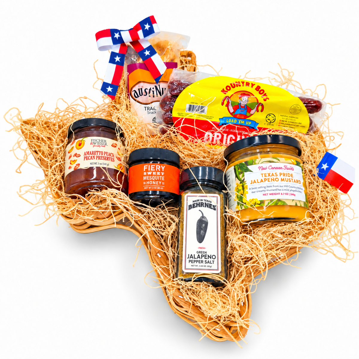 Texas Flavor Trail’s six Texas favorites in a Texas-shaped wicker basket on a white background