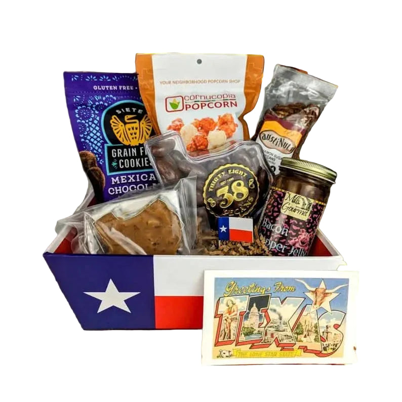 Texas Sweet Tooth Basket filled with chocolate pecans, cookies, popcorn, and Texas-shaped praline