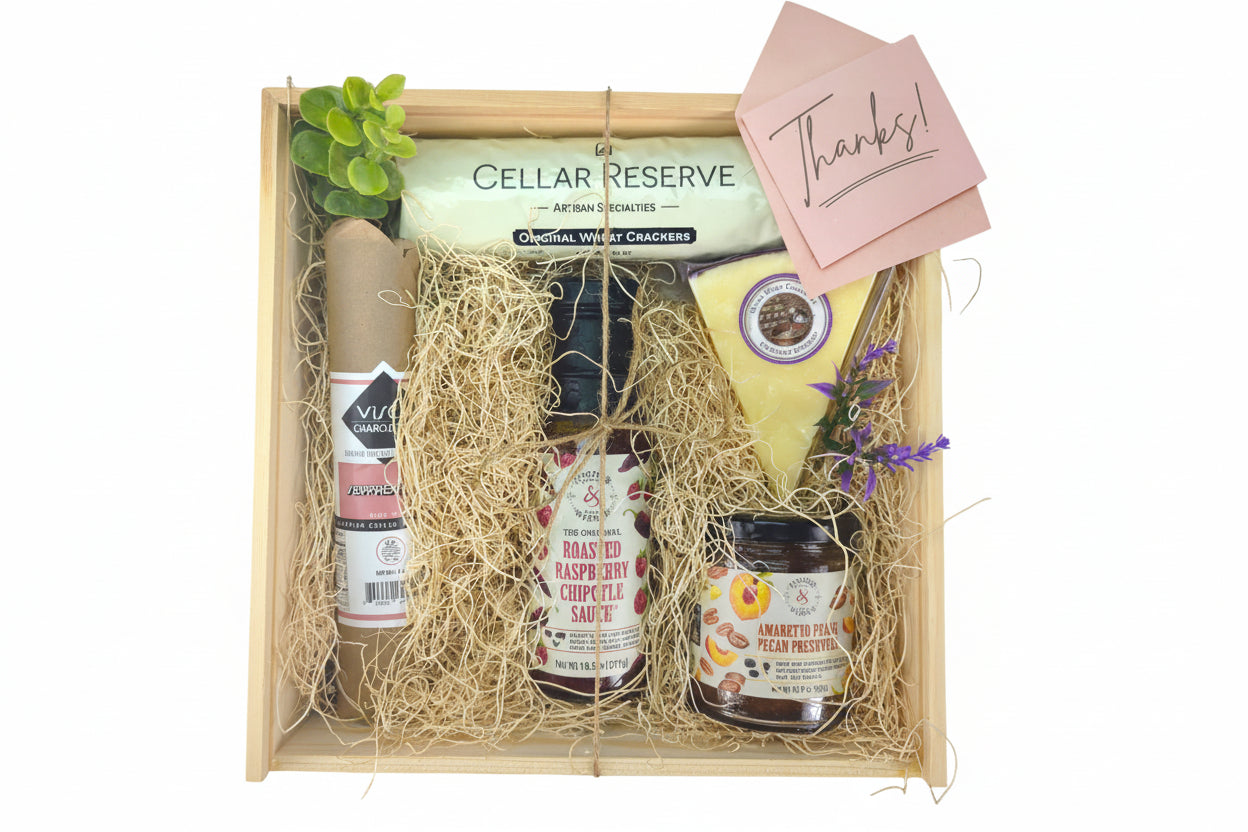 The Grateful Graze Box filled with assorted Texas-inspired treats displayed as a thank-you gift
