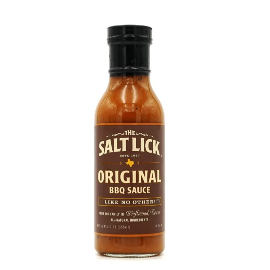 A bottle of The Salt Lick BBQ Original Sauce with a label that includes the brand name and the phrase 'est. 1972', indicating its establishment year.