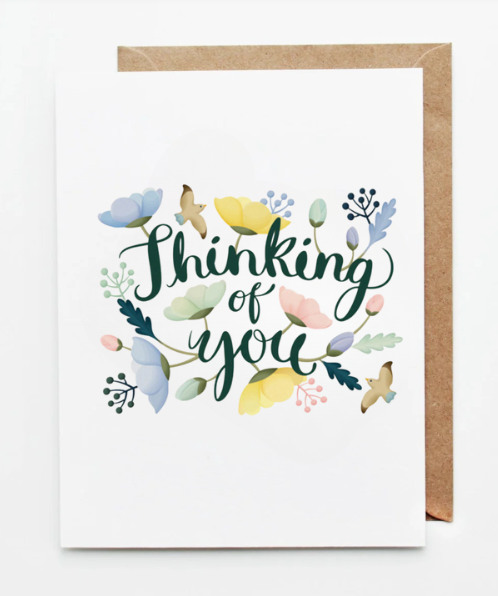 Floral thinking of you greeting card with soft pastel flowers and birds on a white background.