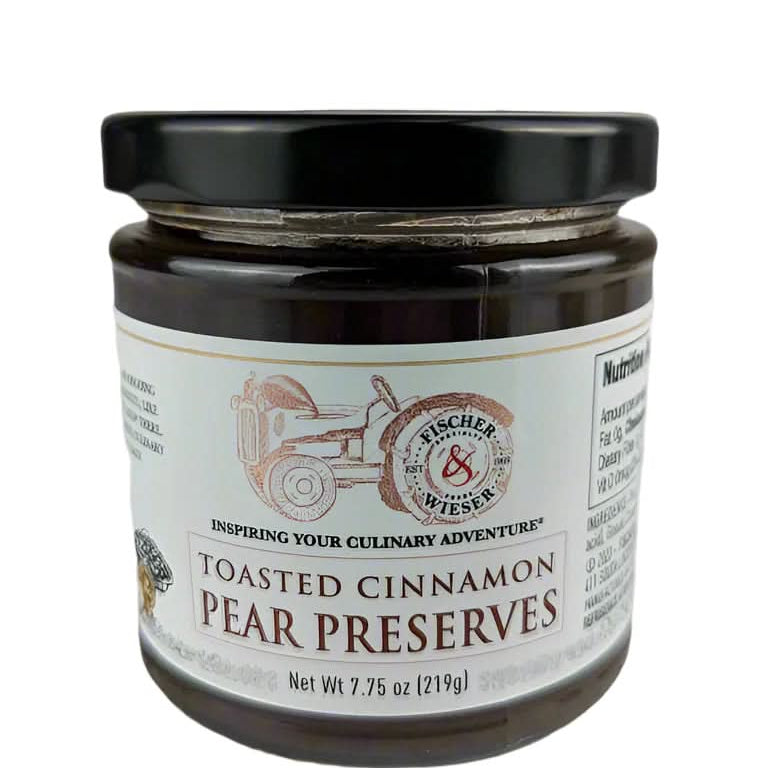 Toasted cinnamon pear preserves jar displayed as a spiced Texas gourmet food gift from The Texas Gift Company storefront