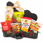 Buc-ee’s Christmas Road Trip curated guitar case gift with six snacks, a Texas truck magnet and holiday ribbon on a white background.