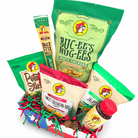 Angled Buc-ee’s Spicy Christmas Crunch with six products in Texas flag tray on white background