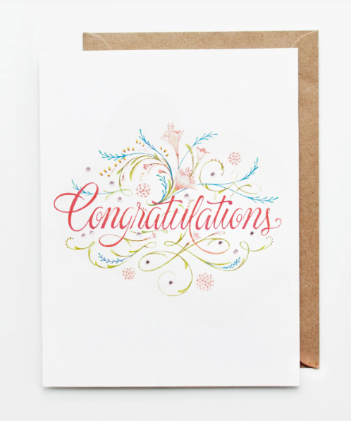 Elegant Congratulations graduation card with colorful floral accents and hand-lettered script.