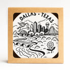 Dallas Texas skyline letterpress coaster set displayed as a Texas-themed home gift from a Texas gift shop storefront