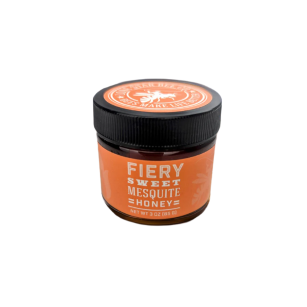 Fiery sweet mesquite honey jar displayed as a sweet and spicy Texas gourmet food gift from The Texas Gift Company storefront