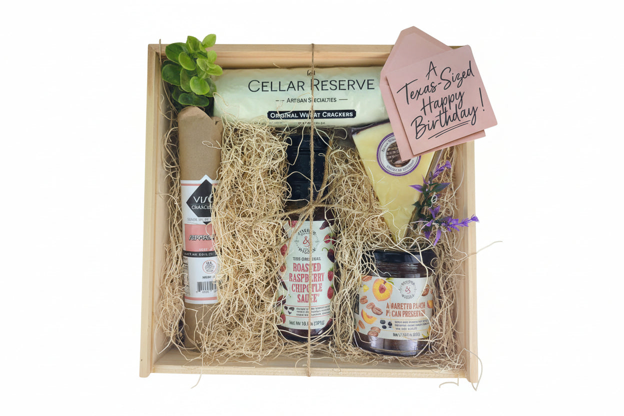 The Hill Country Birthday Box filled with festive Texas-inspired treats arranged for gifting