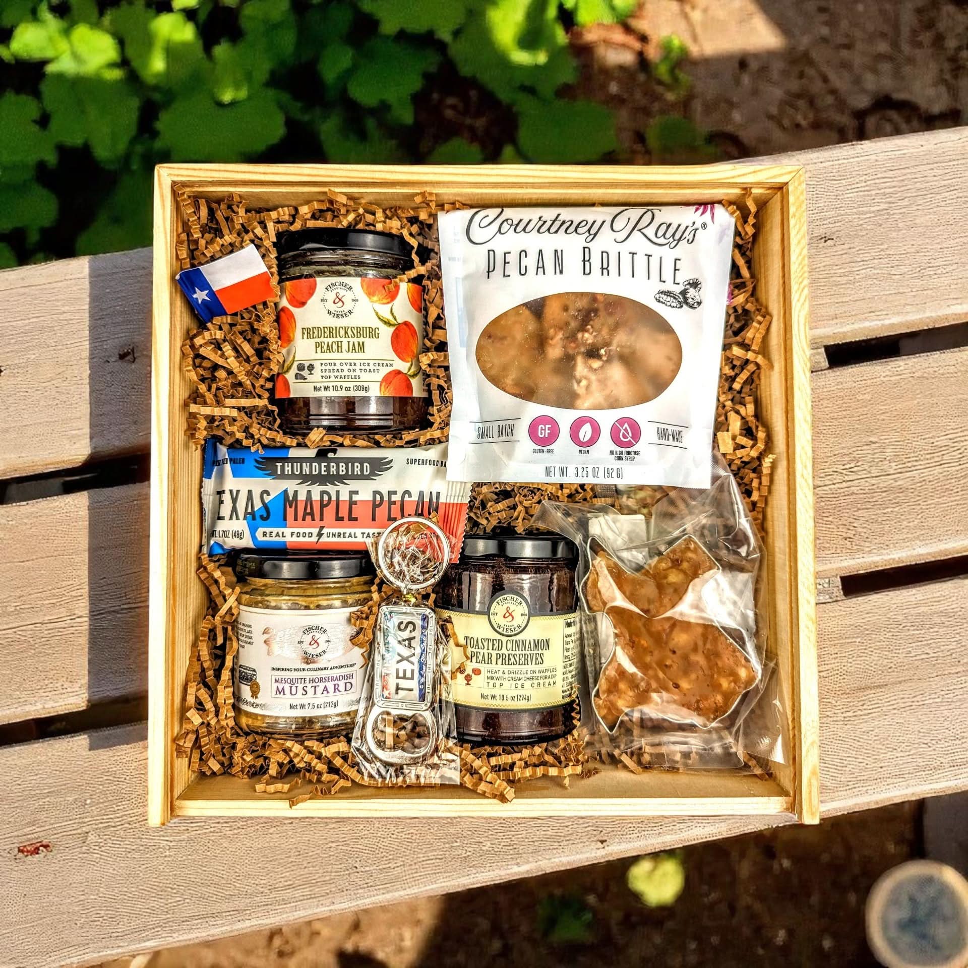 a texas-themed gift box called "Hill Country Homestead", filled with preserves, mustard, jam, pecan brittle, and praline sourced in Texas