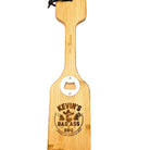 Personalized bamboo bottle opener with engraved “Kevin’s Badass BBQ” design and built-in metal opener on a white background.