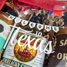Curated Texas BBQ box presented as a warm welcome gift