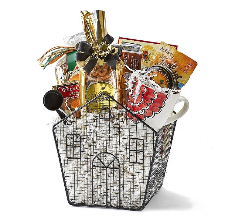 Metal house-shaped container featured as a cozy decorative storage piece