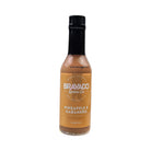 Pineapple and habanero hot sauce bottle displayed as a sweet and spicy Texas gourmet sauce gift from The Texas Gift Company storefront