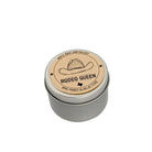 Silver metal tin candle labeled “Rodeo Queen” by White Rock Soap Gallery, featuring a cowboy hat illustration and hand poured in Dallas, Texas, displayed on a white background.