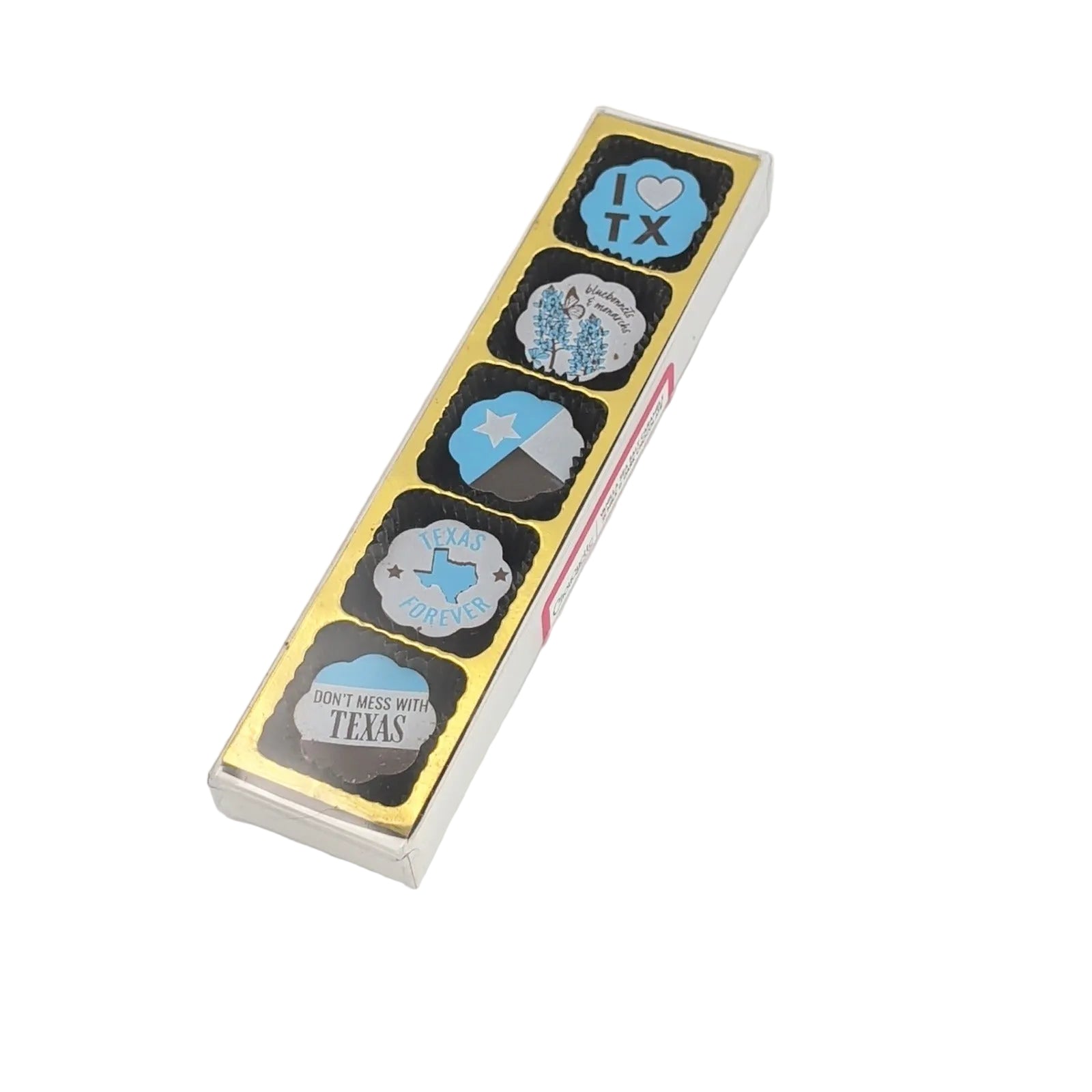 Slim rectangular gift box containing a gold-foil Texas-themed magnet set with designs including “I Love TX,” bluebonnets, Texas star, Texas Forever, and “Don’t Mess with Texas,” displayed on a white background.