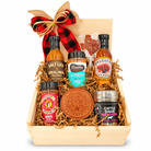 Texas Pitmaster Pantry wooden gift box with seven Texas barbecue favorites and keepsakes on a white background.