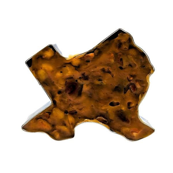 Texas shaped chewy praline with matching cookie cutter displayed as a fun Texas sweet gift from The Texas Gift Company storefront