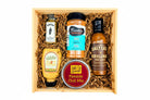 Curated Texas BBQ box presented with sauces and seasonings for gifting
