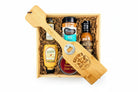 Texas Smoke & Spice BBQ gift box with smoky sauces and spicy rubs arranged for grilling
