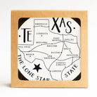 Texas state map design coaster set displayed as a Texas-themed home gift from a Texas gift shop storefront