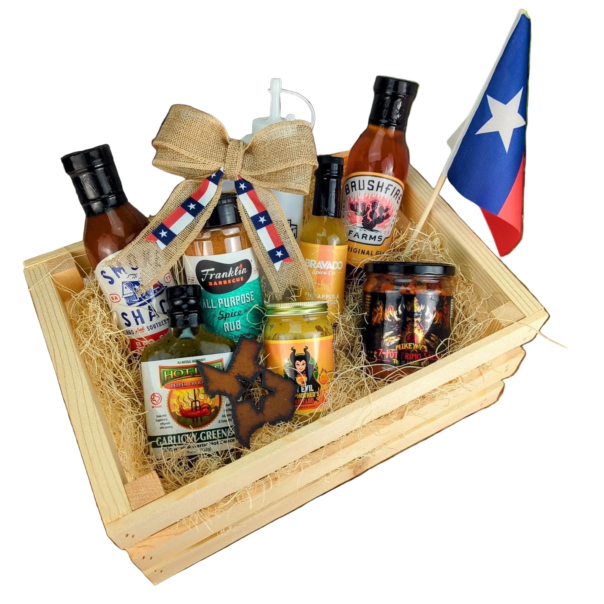 A generous gift crate brimming with Texas BBQ treats, including BBQ seasoning, fiery mustard, BBQ sauce, salsa, and glaze
