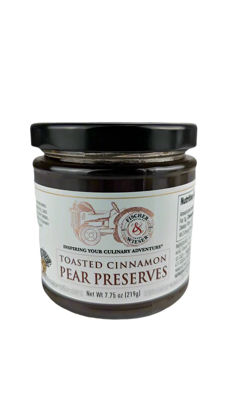 Toasted cinnamon pear preserves jar displayed as a spiced Texas gourmet food gift from The Texas Gift Company storefront