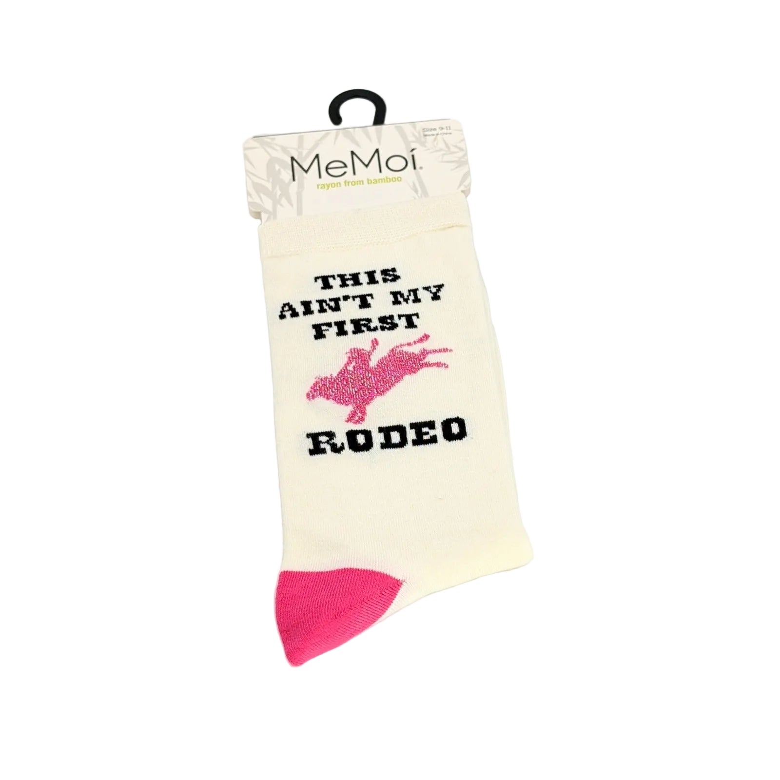 Single cream bamboo sock with a pink cowgirl graphic and the phrase “This Ain’t My First Rodeo,” displayed with retail tag on a white background.
